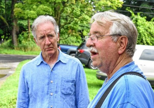 Rep Richard Neal listens to dairy farmer Dave Duprey talk about the history of the Sunbrite Farm in Bernardston on Tuesday.   August 14, 2018