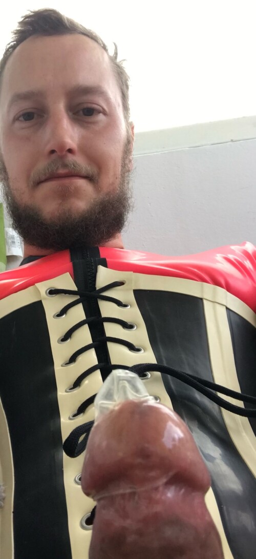 Slave-Benjamin-fiegl-wearing-pink-Latexcatsuit-black-Latex-corset-and-jerking-into-condom-b-blackmail-mistress-uploading-it-Full-Name-permanent-online.jpg